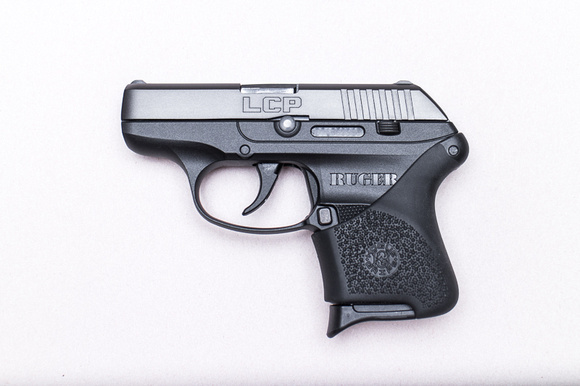 Standard 6 Round Magazine with extended base plate and Hogue grip